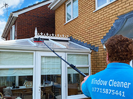 Conservatory roof cleaning by professional window cleaner in Cardiff