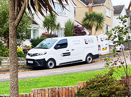 Lewis Cleaning Services branded van window cleaning in the Pantmawr part of Cardiff